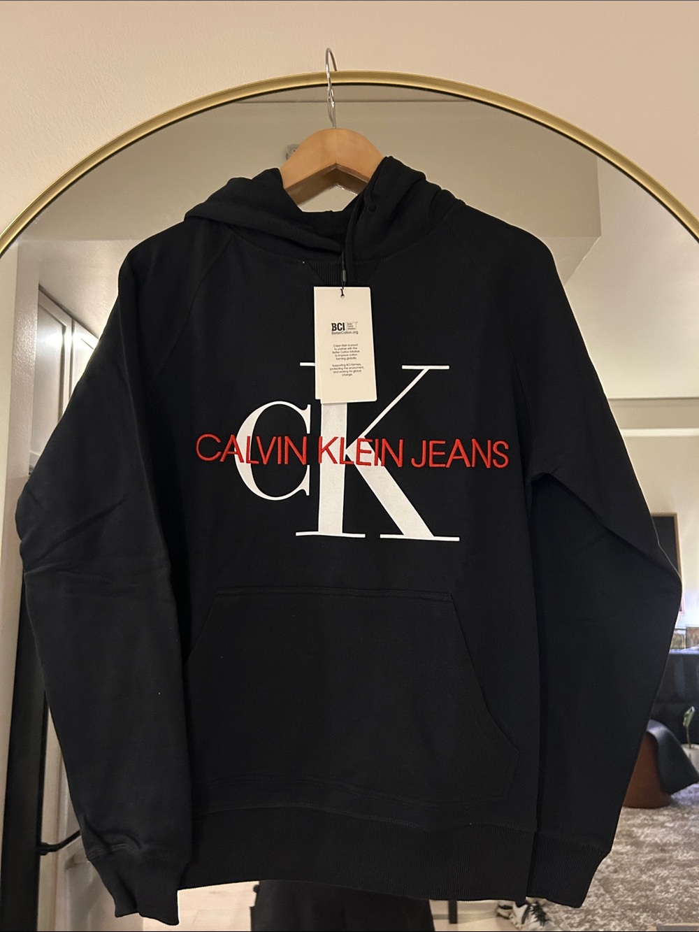 Calvin Klein Jeans Black Hoodie with White CK and Red Branding